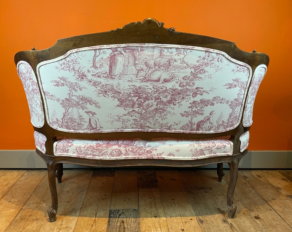 French Louis XV revival walnut sofa, newly upholstered in vintage toile de jouy View VI