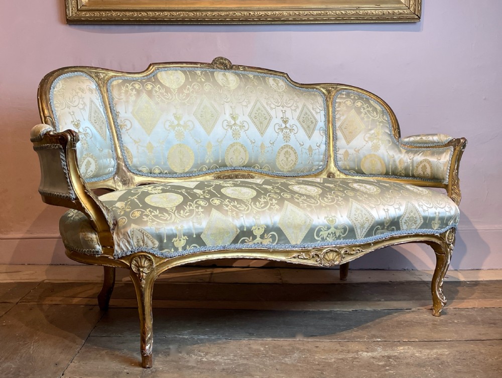 19th century French Louis XV revival giltwood sofa