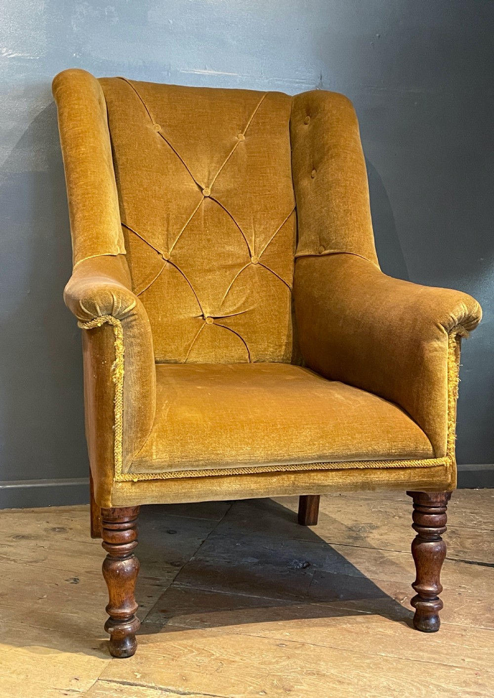 Victorian wingback armchair with buttoned upholstery View II