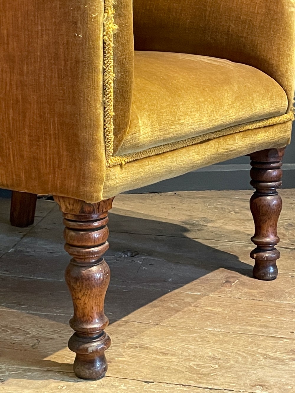 Victorian wingback armchair with buttoned upholstery View V