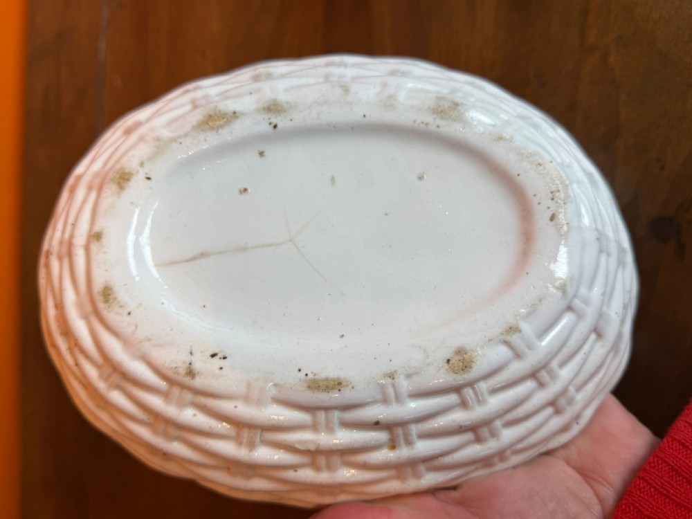 A Victorian Staffordshire Jackfield ceramic covered dish featuring a black glazed hen resting atop a white basketweave earthenware base. View III