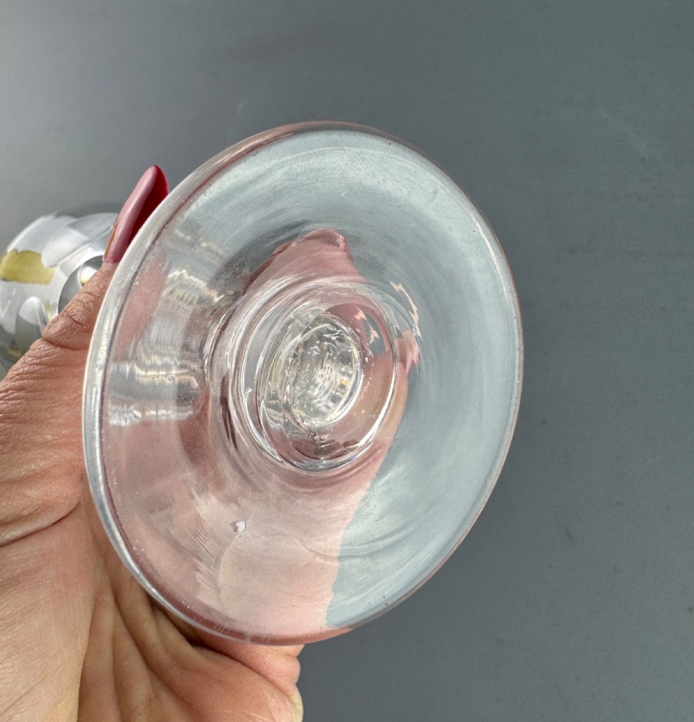 A clear Victorian deception glass featuring a thick-walled thumb-cut bowl, short stem, and circular foot. View III