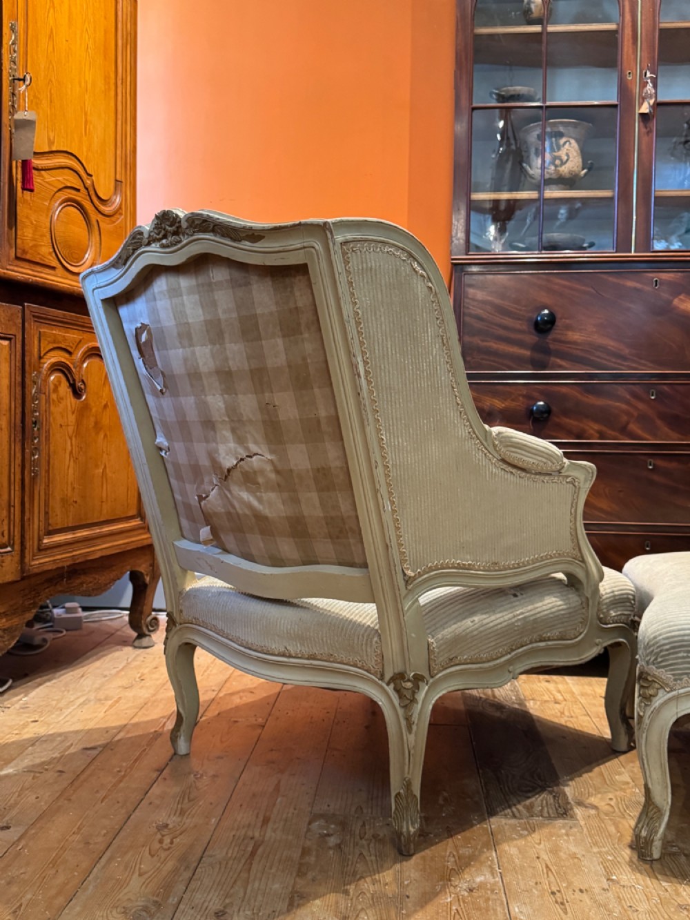 A French Louis XV style duchesse brisee comprising a painted armchair and matching footstool with cabriole legs and neutral upholstery. View VIII