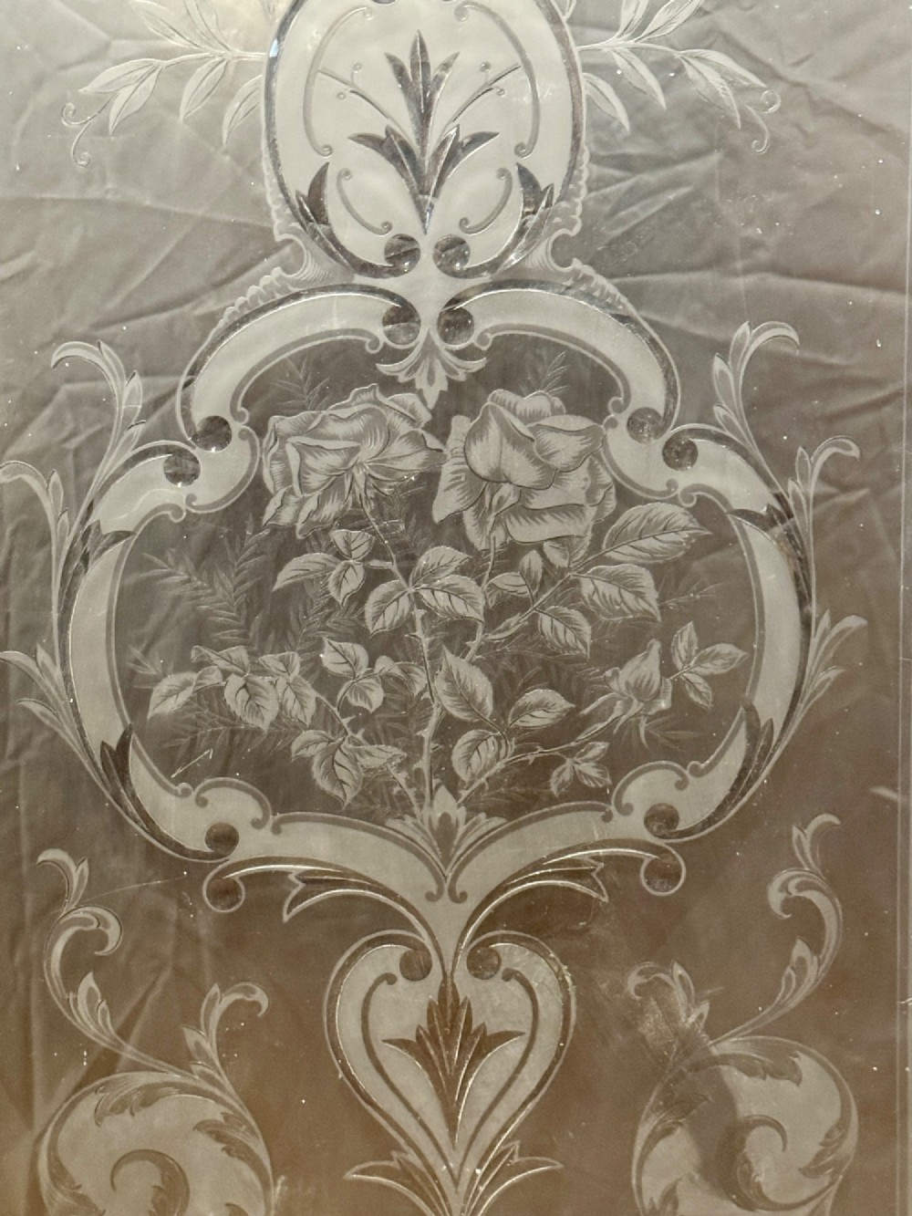 A rectangular clear glass panel decorated with Victorian acid-etched floral and scrollwork patterns. View II