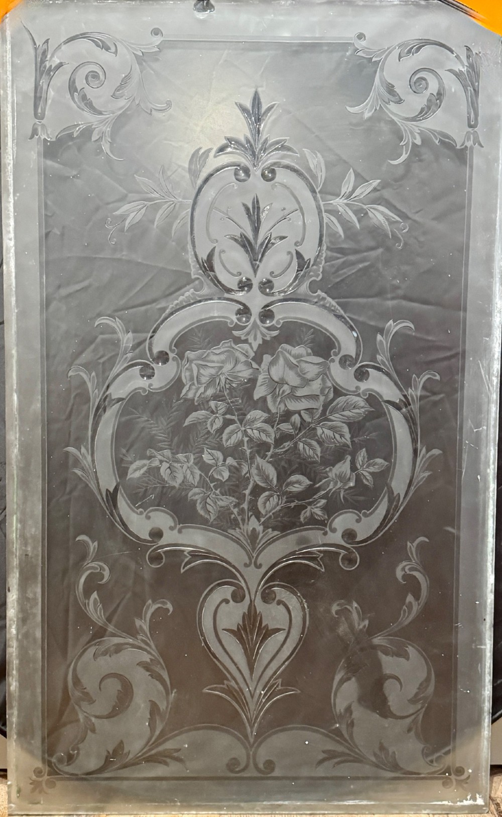 A rectangular clear glass panel decorated with Victorian acid-etched floral and scrollwork patterns. View III