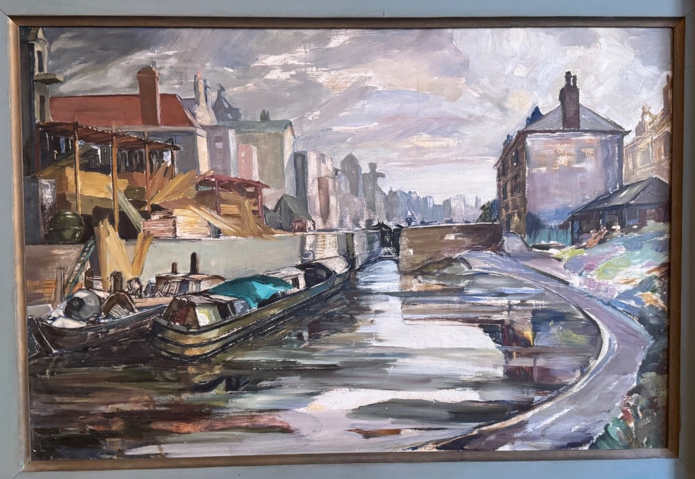 A large framed mid-century oil painting depicting barges along Regents Canal beside a timber yard in muted grey and brown tones. View II