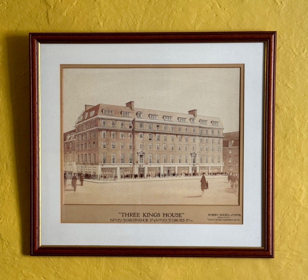 A framed 1920s sepia architectural watercolour rendering depicting the facade of Three Kings House in London, presented within a wide cream mount and dark wooden frame.