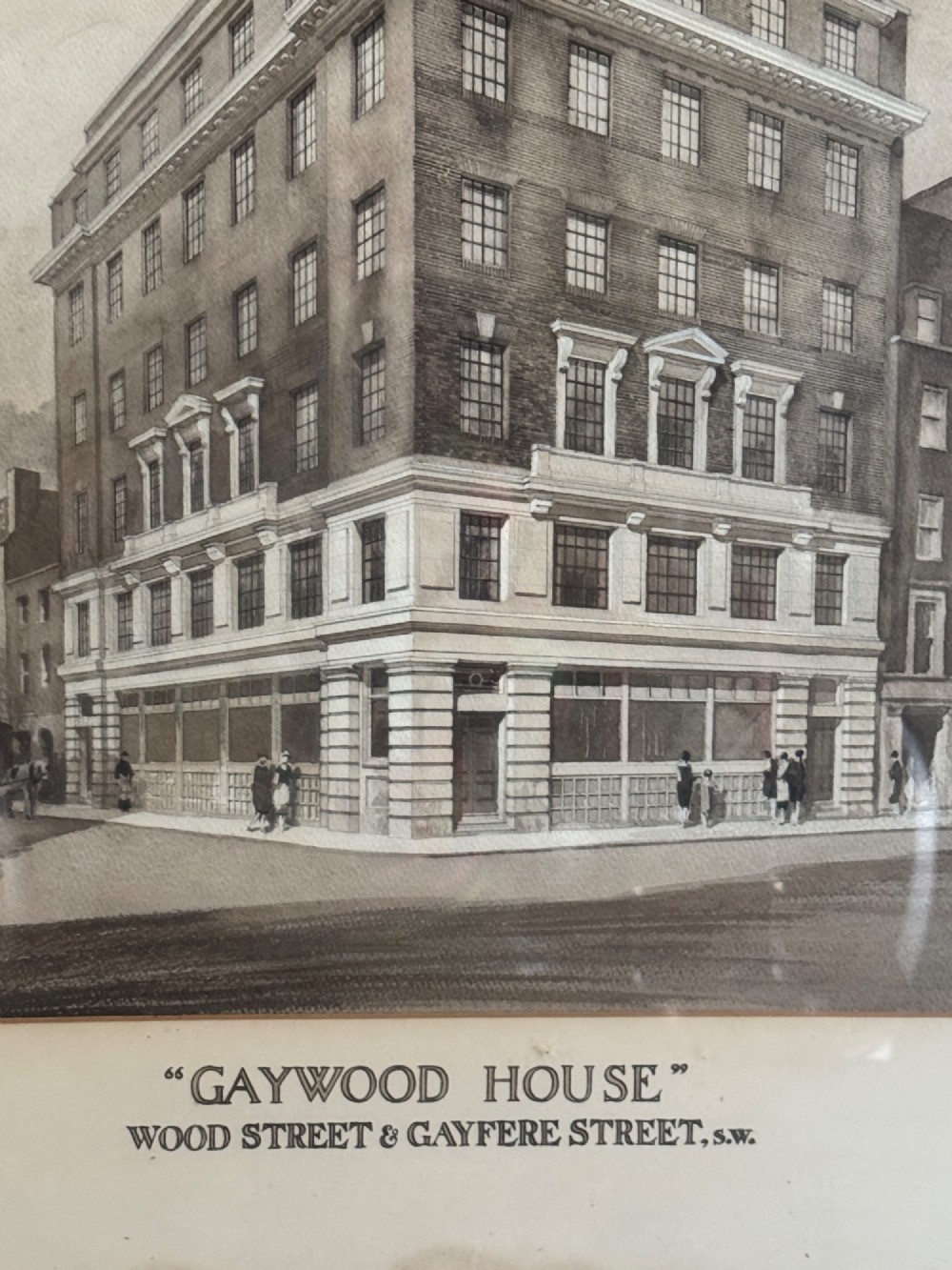 A framed 1920s monochrome architectural watercolour drawing of Gaywood House in Westminster, depicted from a street corner perspective within a black frame. View IV