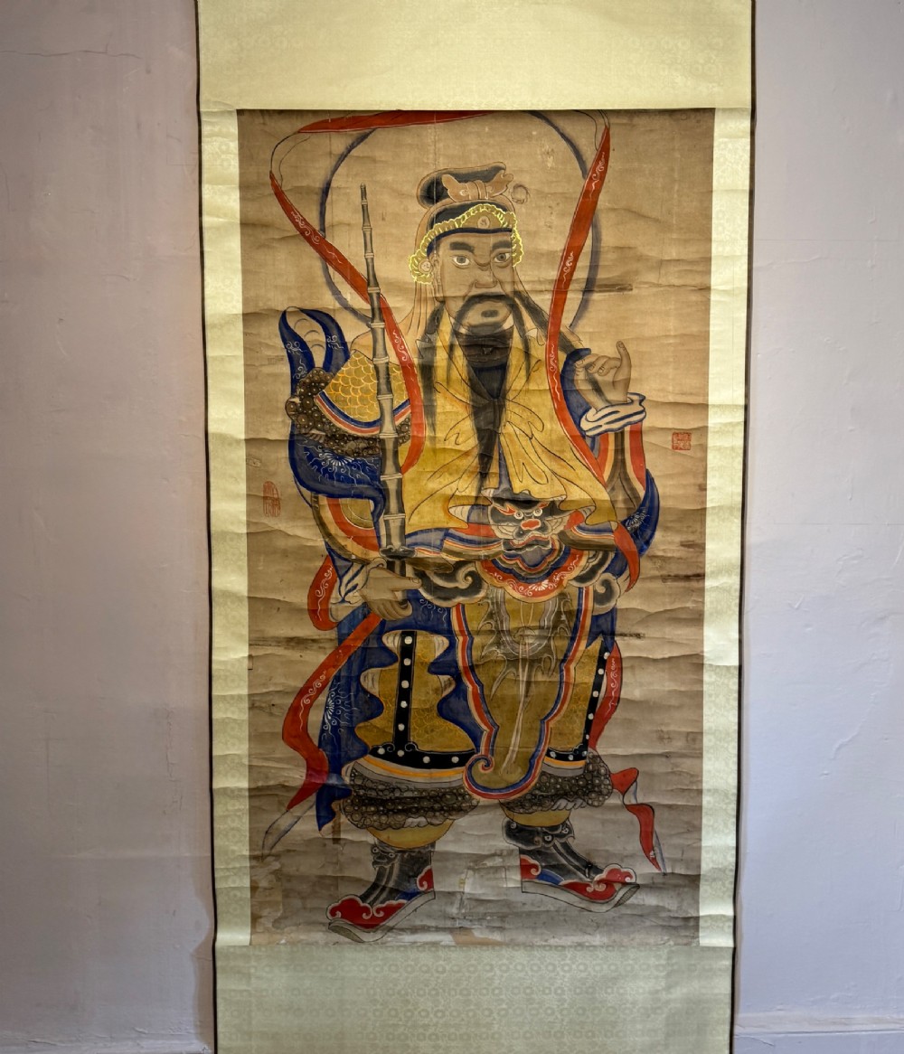 A nineteenth-century Chinese hanging scroll depicting the armoured Daoist deity Yuchi Gong mounted on light gold silk background fabric. View II