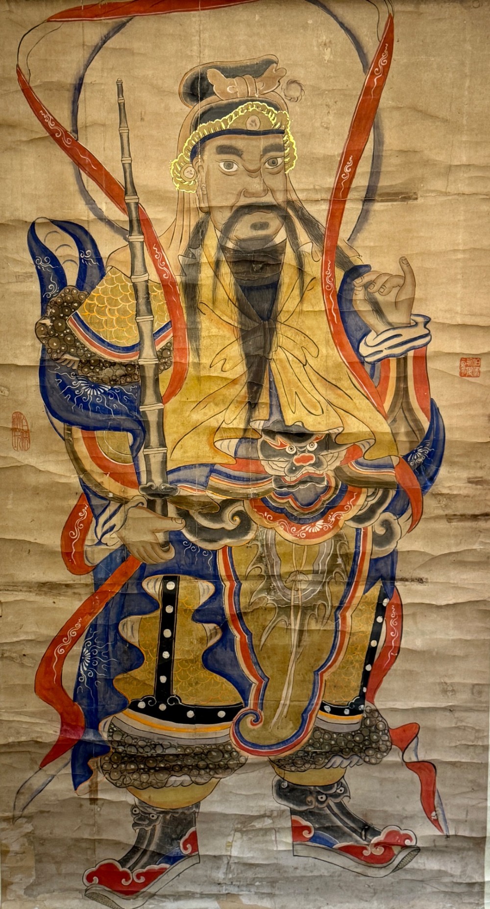 A nineteenth-century Chinese hanging scroll depicting the armoured Daoist deity Yuchi Gong mounted on light gold silk background fabric. View IV