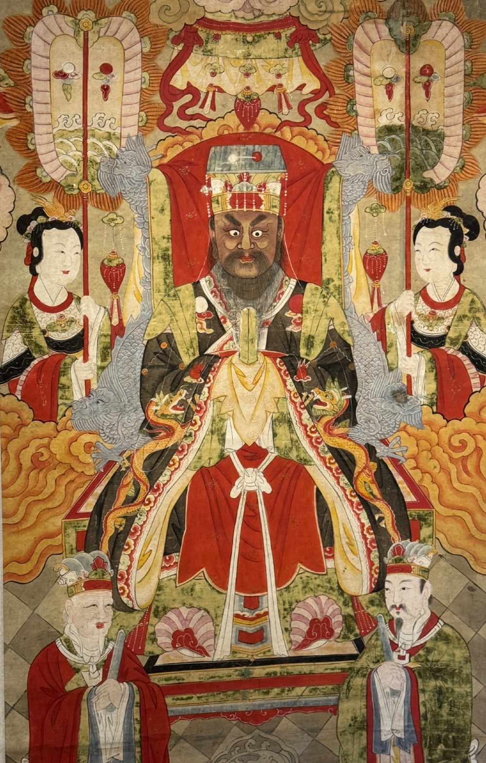 A vertical 19th-century Chinese hanging scroll painting on a pale silk mount depicting an enthroned Daoist judge surrounded by court attendants and mythological figures in red and green ceremonial robes. View II