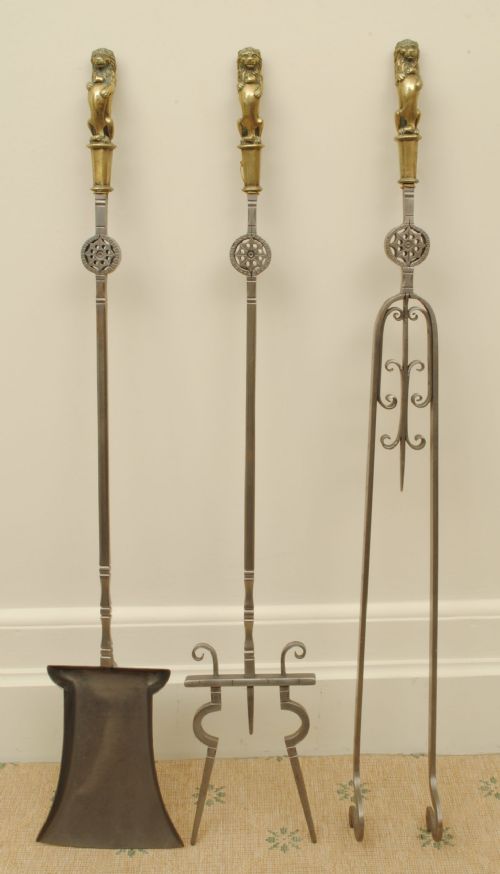 A Large and Impressive Set of Brass and Steel Fire Irons