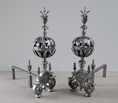 A STUNNING PAIR OF ARTS AND CRAFTS STEEL ANDIRONS - ADDITIONAL PHOTO 1