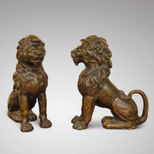 A Super Pair of Patinated Cast Iron Lions