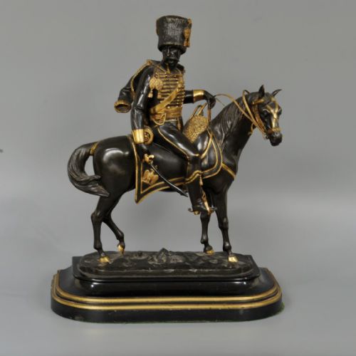 A Bronze and Gilt Figure of an Officer on Horse Back