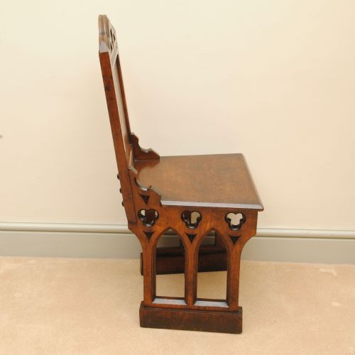 A PAIR OF 19TH CENTURY GOTHIC DESIGN PITCH PINE HALL CHAIRS - ADDITIONAL PHOTO 2