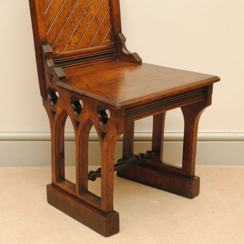A PAIR OF 19TH CENTURY GOTHIC DESIGN PITCH PINE HALL CHAIRS - ADDITIONAL PHOTO 4