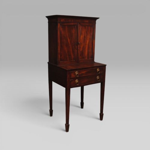 A GEORGE III PERIOD MAHOGANY WRITING CABINET ON STAND