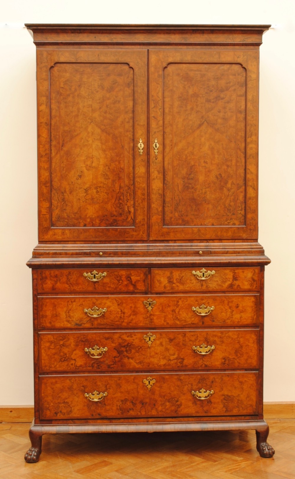  early 18th century Walnut cabinet on chest.