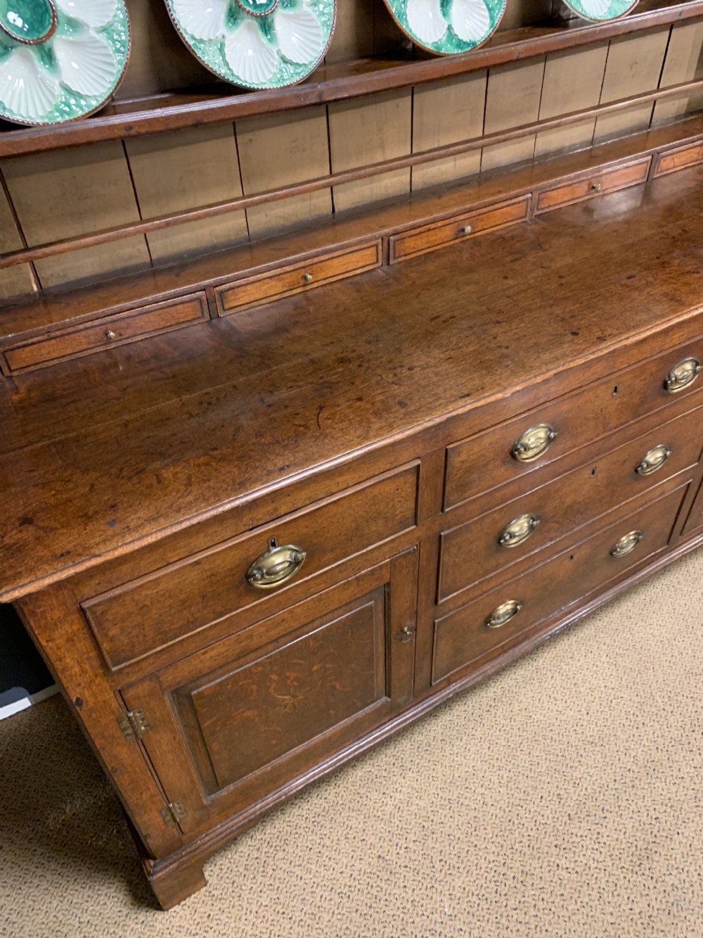 A good late 18th century oak dresser and original rack View III