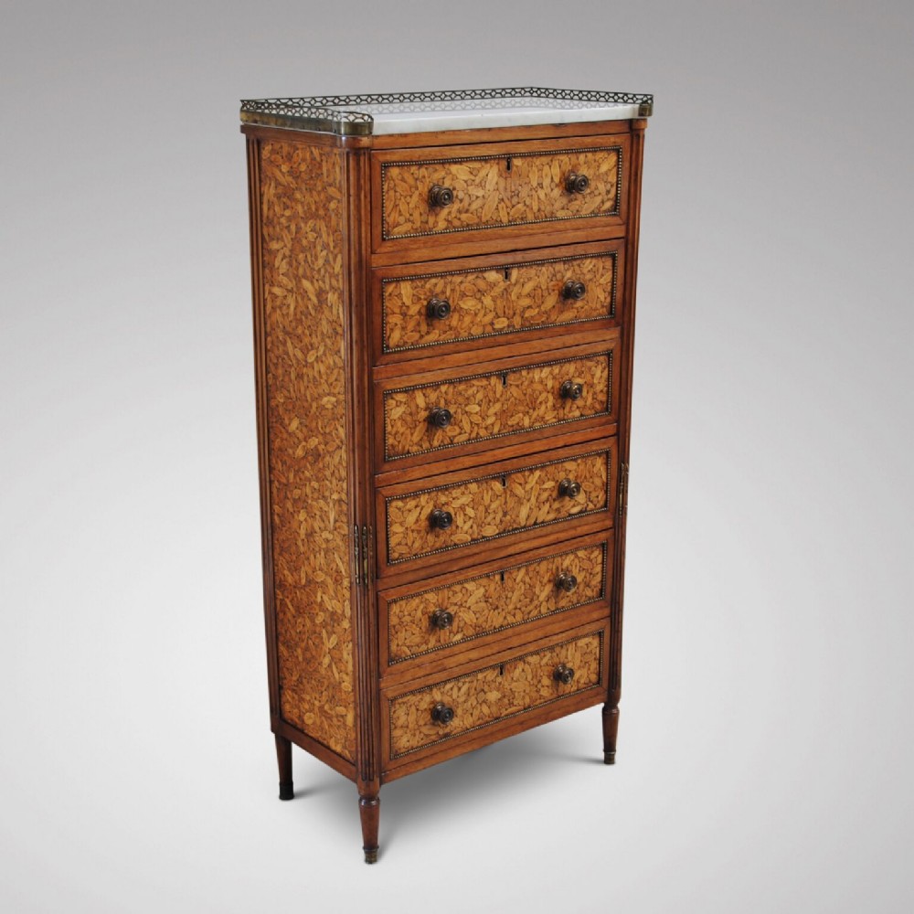 A RARE AND UNUSUAL OYSTER VENEER TALL CHEST