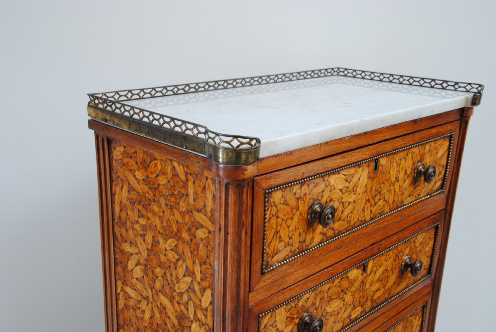 A RARE AND UNUSUAL OYSTER VENEER TALL CHEST View III
