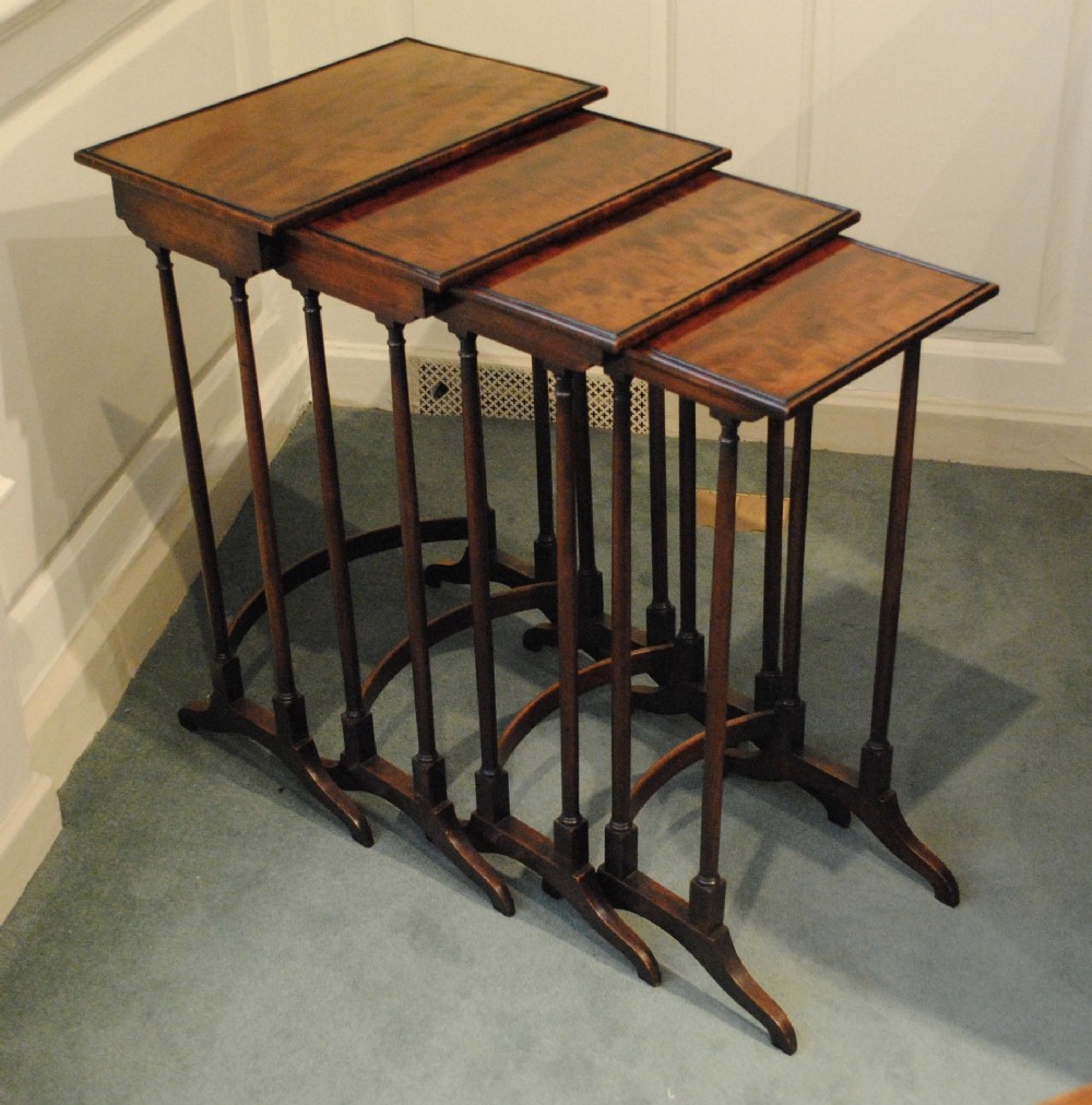 FINE QUARTETTO NEST OF MAHOGANY TABLES