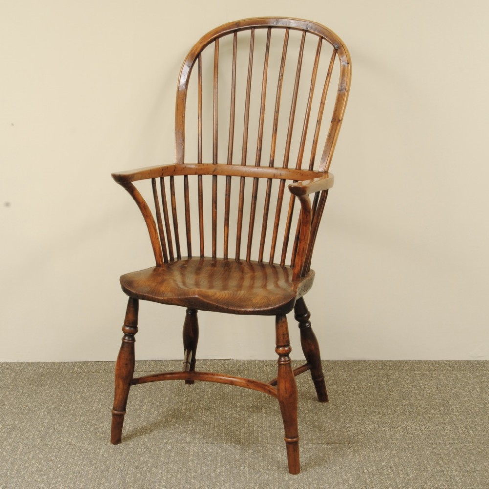 A GOOD LINCOLNSHIRE YEW WOOD STICK BACK WINDSOR ARM CHAIR