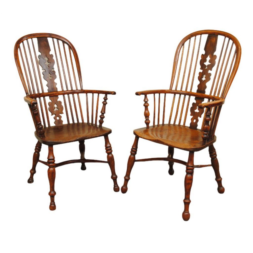 A MATCHED PAIR OF NOTTINGHAMSHIRE YEW WOOD HIGH BACK WINDSOR ARMCHAIRS