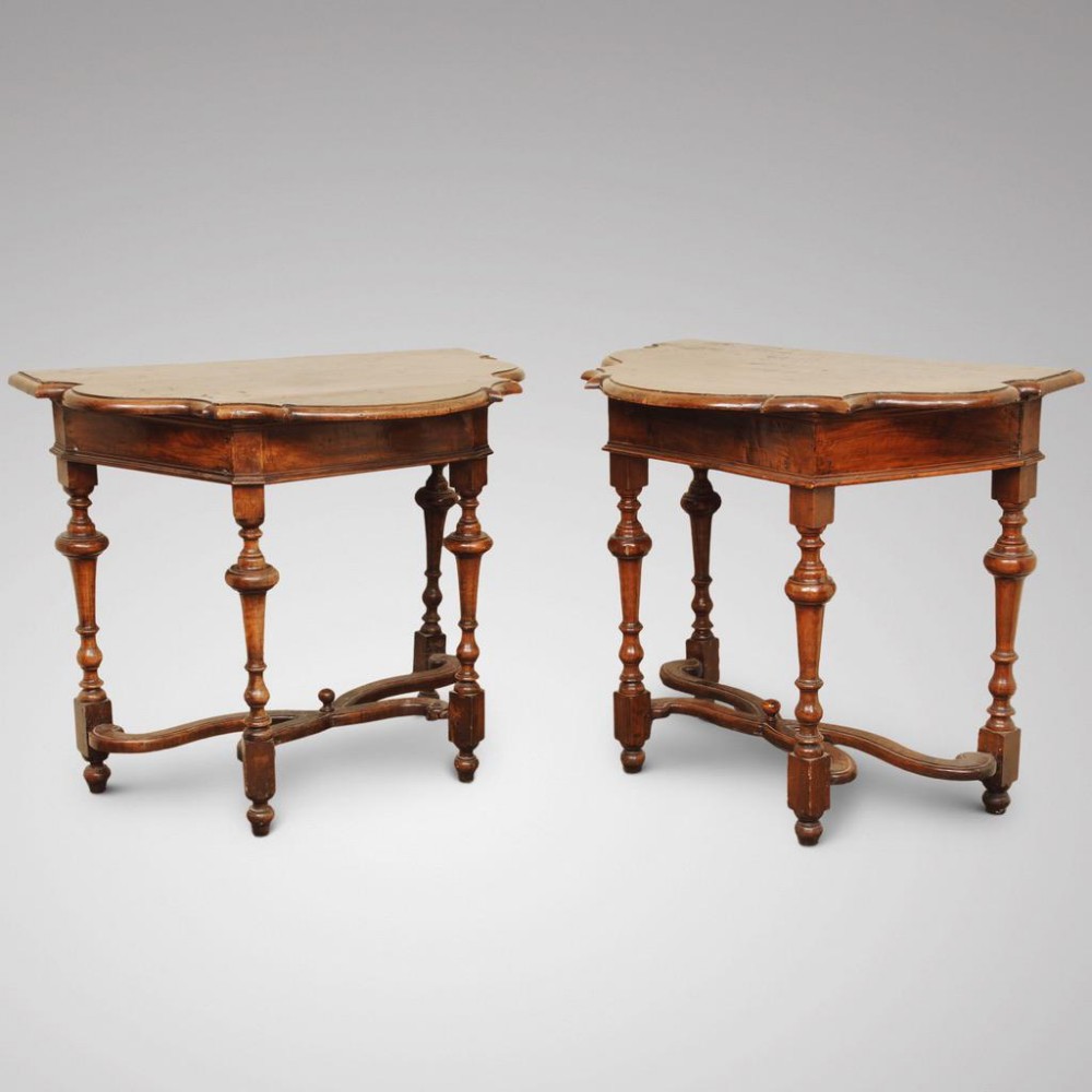TWO SIMILAR EARLY 18TH CENTURY ITALIAN WALNUT CONSOLE TABLES
