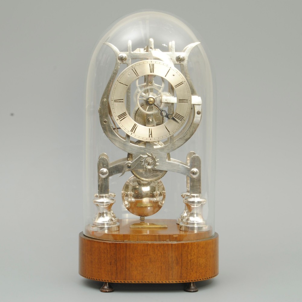 AN UNSUAL 19TH CENTURY SILVERED SKELETON CLOCK