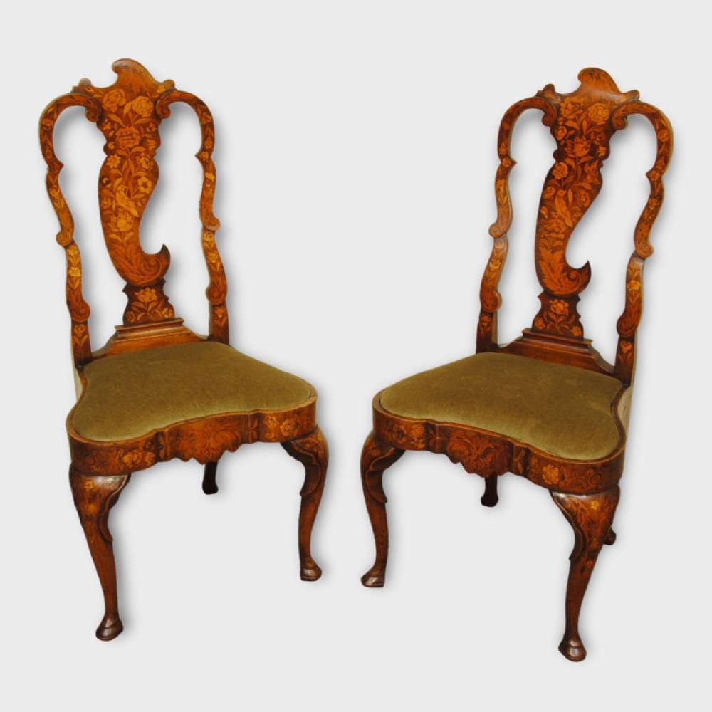 AN ELEGANT PAIR OF 18TH CENTURY DUTCH MARQUETRY CHAIRS