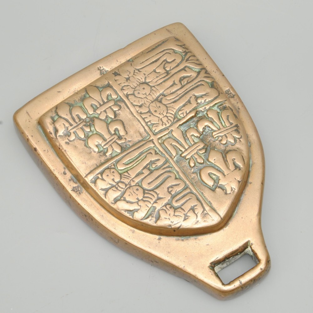 A RARE EARLY EXAMPLE OF A WOOL WEIGHT
