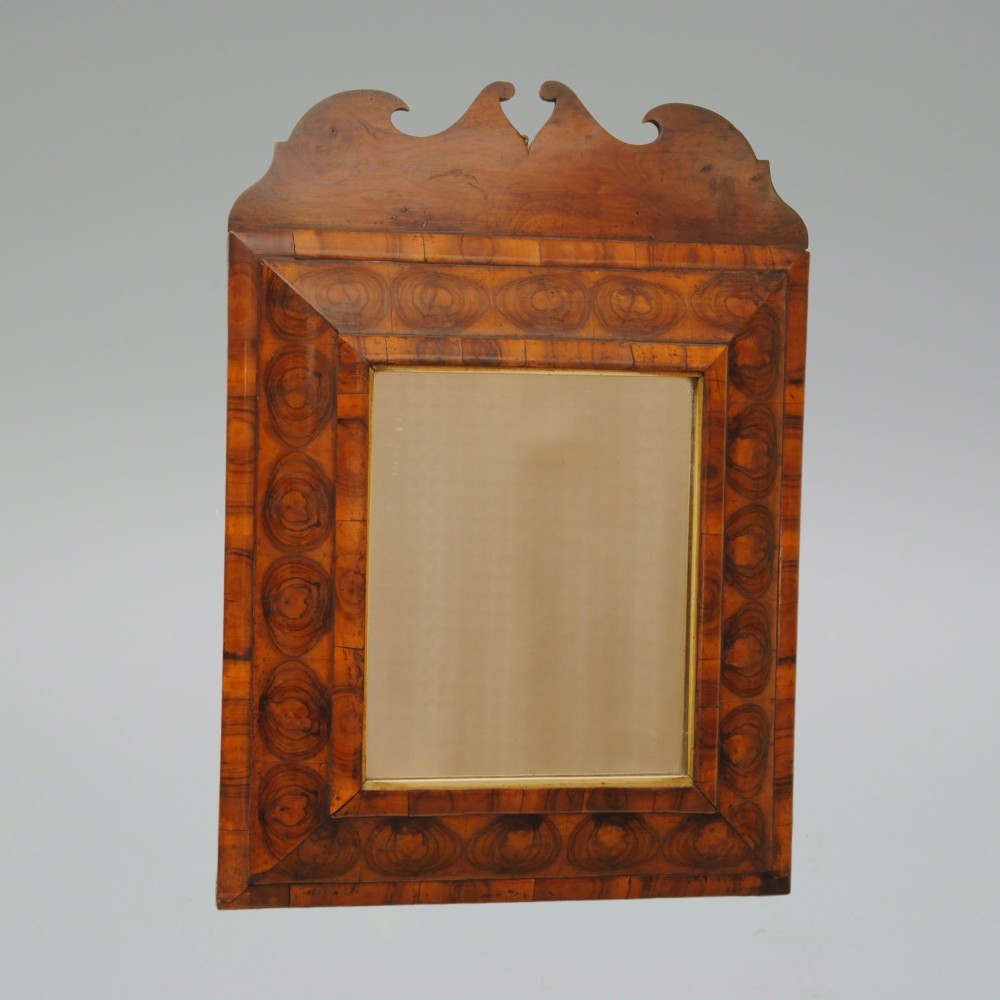EARLY 18TH CENTURY OYSTER VENEER CUSHION MIRROR