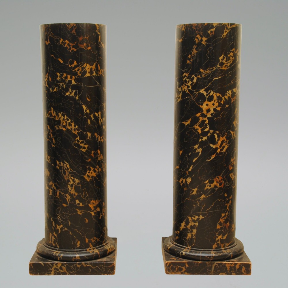 A PAIR OF MID 19TH CENTURY SIMULATED MARBLE COLUMNS