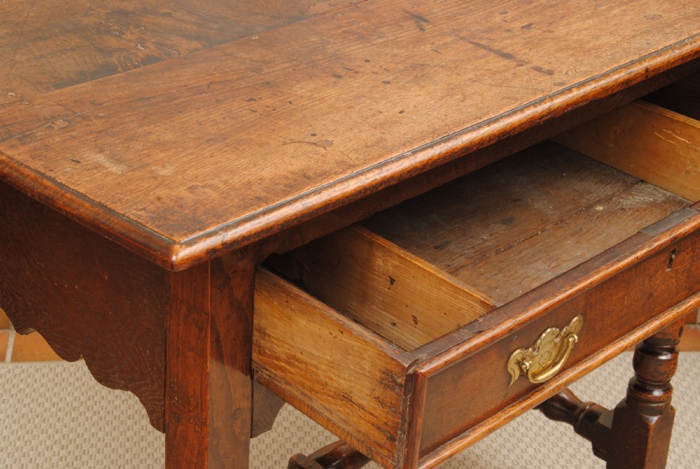 A SINGLE DRAWER OAK SIDE TABLE View IV