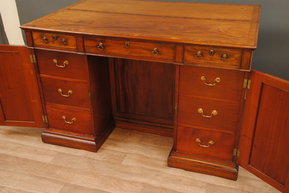 A FINE MAHOGANY FREE STANDING LIBRARY DESK View VI