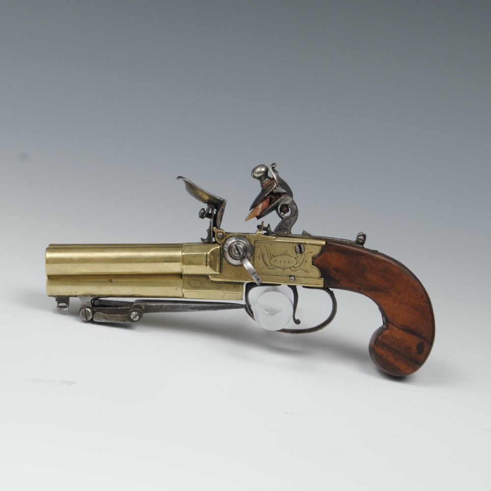 A TRIPLE BARREL BRASS BOXLOCK PISTOL WITH BAYONET BY BASS