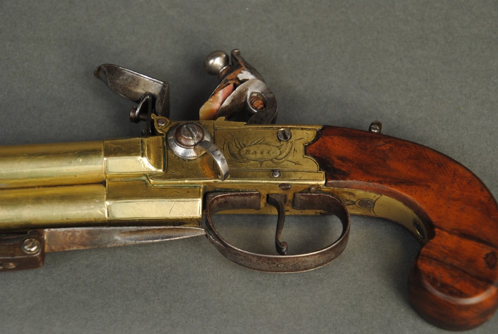 A TRIPLE BARREL BRASS BOXLOCK PISTOL WITH BAYONET BY BASS View VII