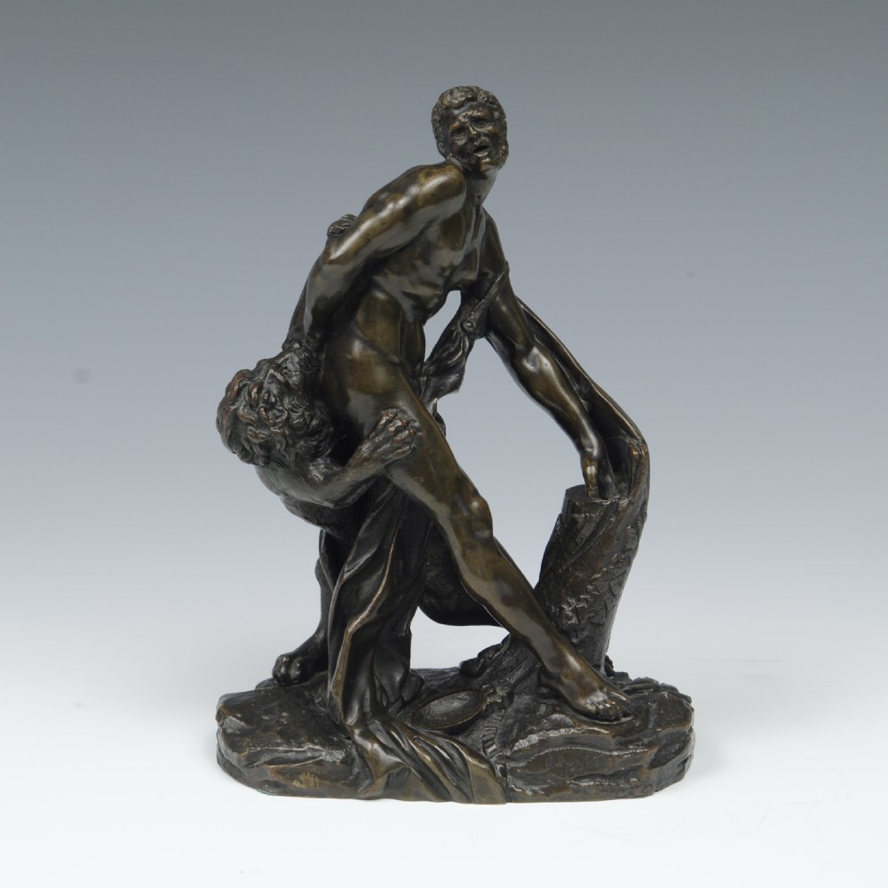 A BRONZE FIGURE OF MILO OF CROTON AFTER PIERRE PUGET