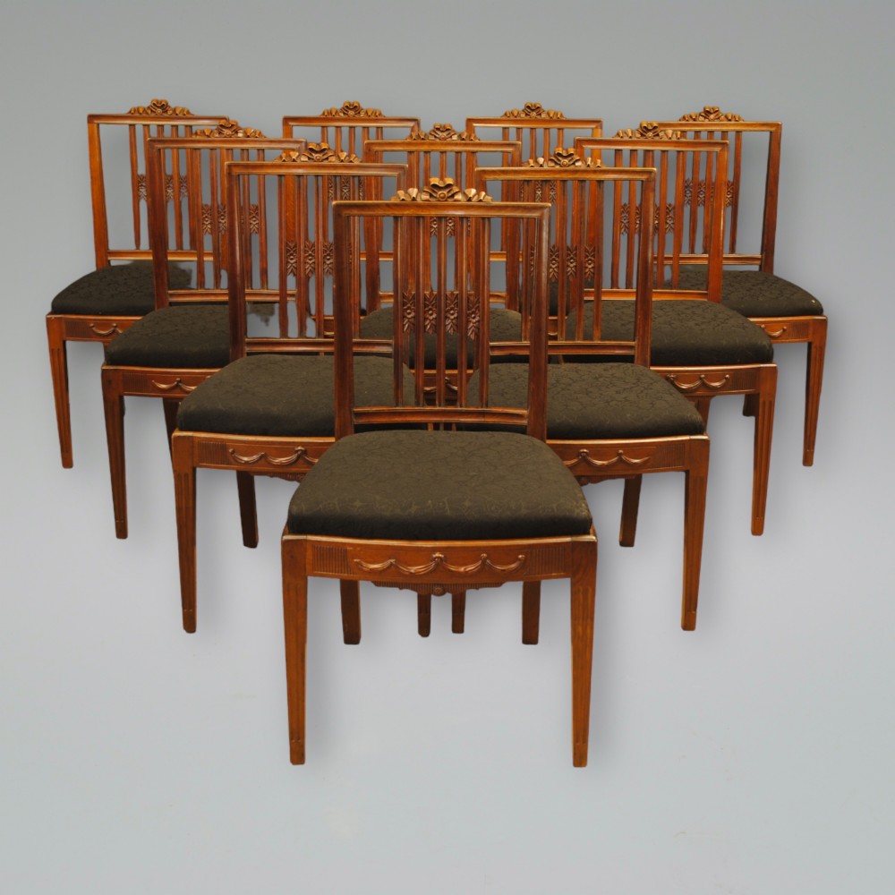 A SET OF TEN 19TH CENTURY DUTCH MAHOGANY CHAIRS