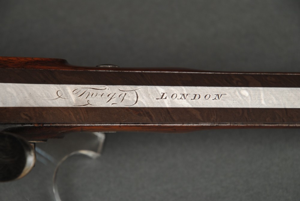 A FINE CASED PAIR OF FLINTLOCK PISTOLS BY TWIGG View II