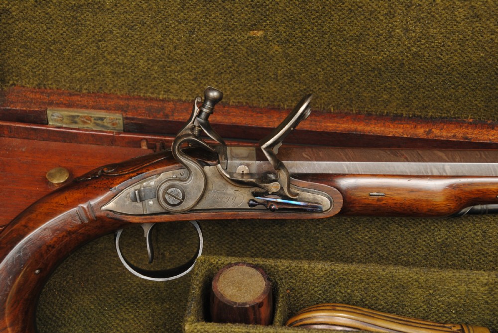 A FINE CASED PAIR OF FLINTLOCK PISTOLS BY TWIGG View III