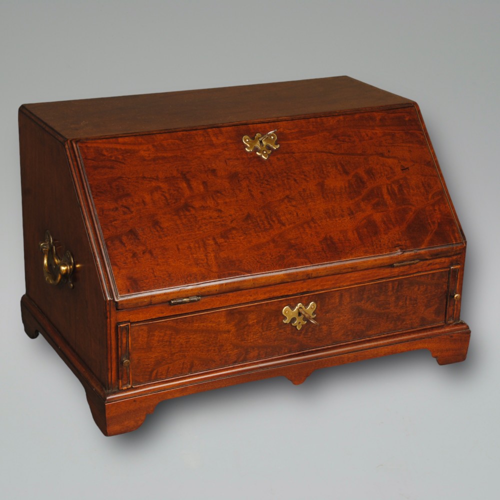 A RARE MINIATURE 18TH CENTURY MAHOGANY TABLE BUREAU