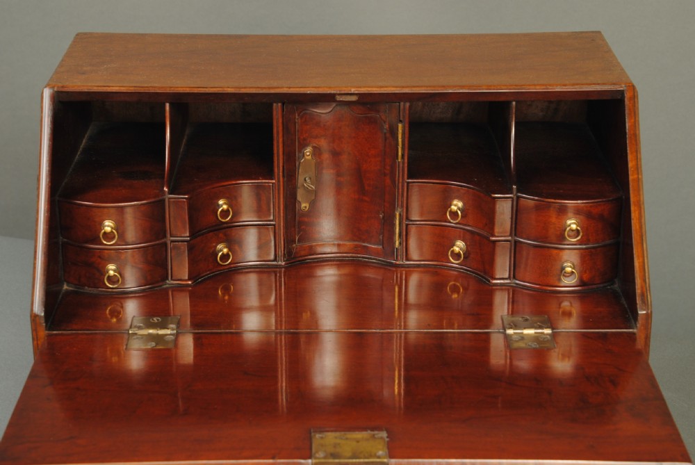A RARE MINIATURE 18TH CENTURY MAHOGANY TABLE BUREAU View V