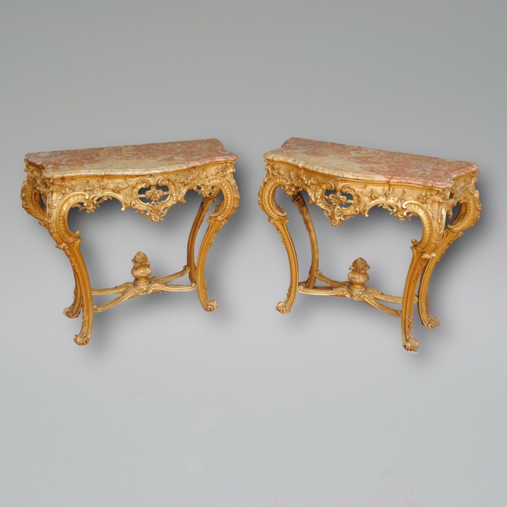 PAIR OF FRENCH CARVED GILTWOOD CONSOLE TABLES