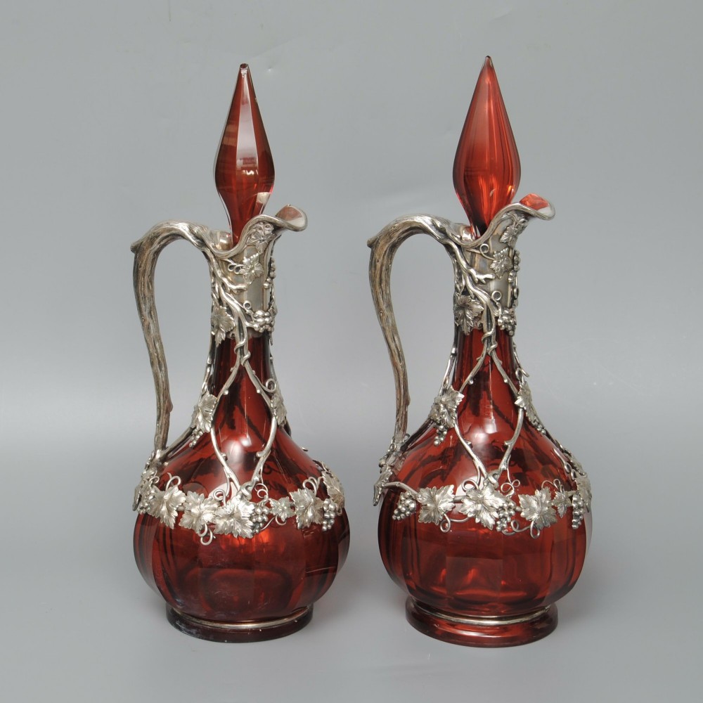 A SUPER PAIR OF RUBY GLASS CLARET JUGS IN ORIGINAL FITTED CASE