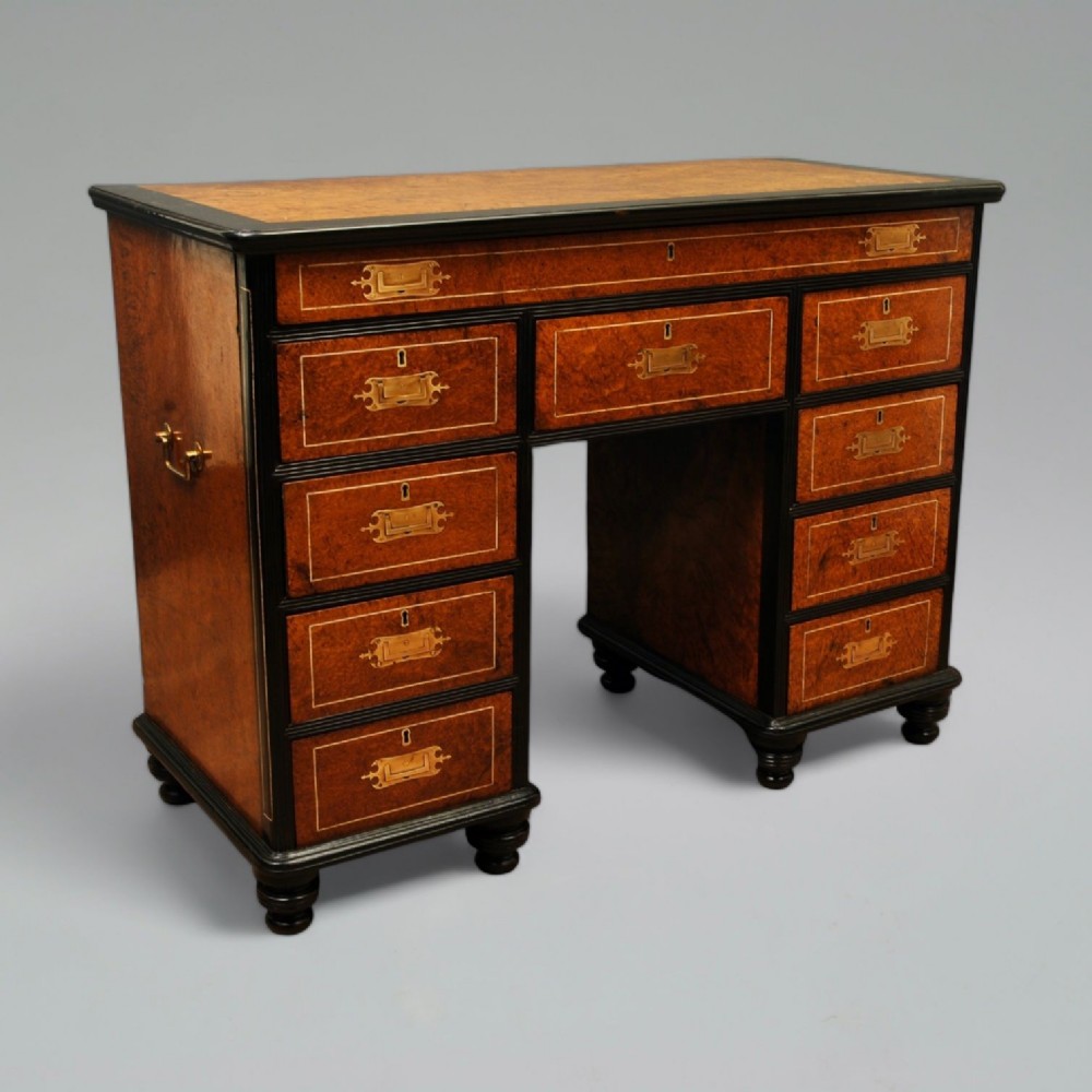 A SUPER EXAMPLE OF A CHINESE EXPORT AMBOYNA AND EBONY DESK