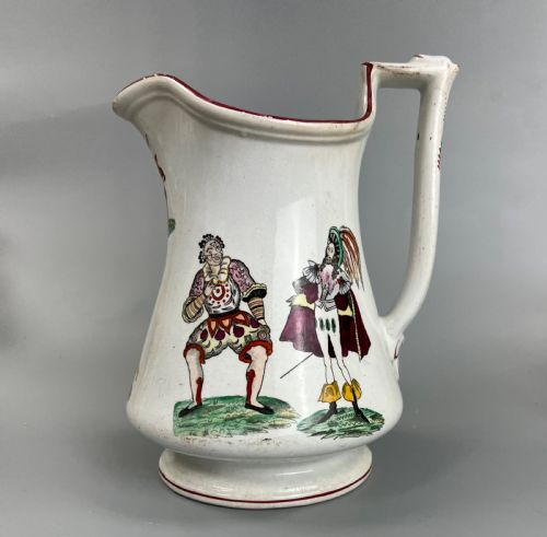fig 1. A cream earthenware ceramic jug decorated with hand-coloured transfer prints of circus performers and clowns with a red painted rim.