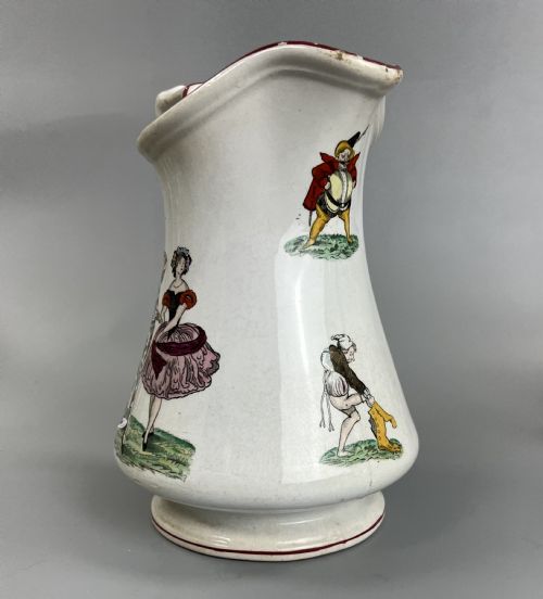 fig 2. A cream earthenware ceramic jug decorated with hand-coloured transfer prints of circus performers and clowns with a red painted rim.